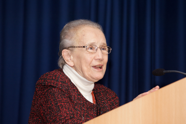 Colour head and shoulders photograph of Catherine McGuinness, a former Member of Seanad Éireann, standing at a lectern and addressing an audience.