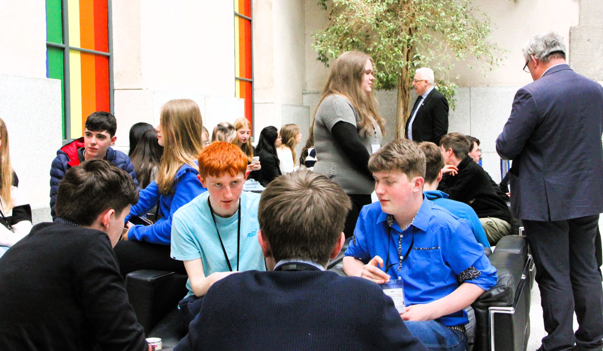 TY students attending workshops in Leinster House meet TDs for an informal chat during their lunch break
